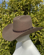 Sombrero Houston beige estilo western con cinta decorativa lateral